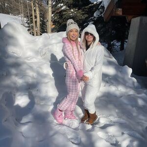 Pink and white snowsuit